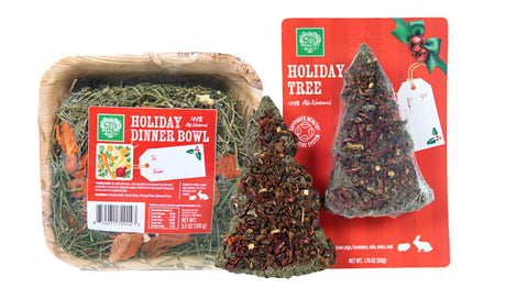 Two pet treat packages: one labeled 'Holiday Dinner Bowl' and the other 'Holiday Tree'.